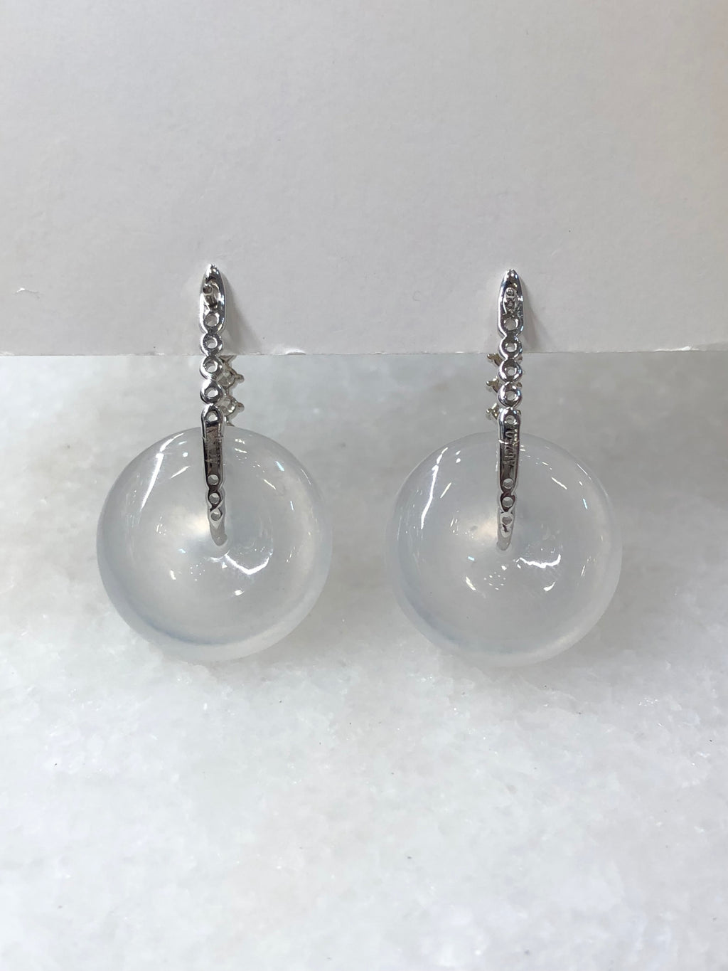 Natural Type A highly translucent, near glassy icy white jadeite safety coin earrings set in 18K white gold and natural diamonds | ClassicJade Singapore