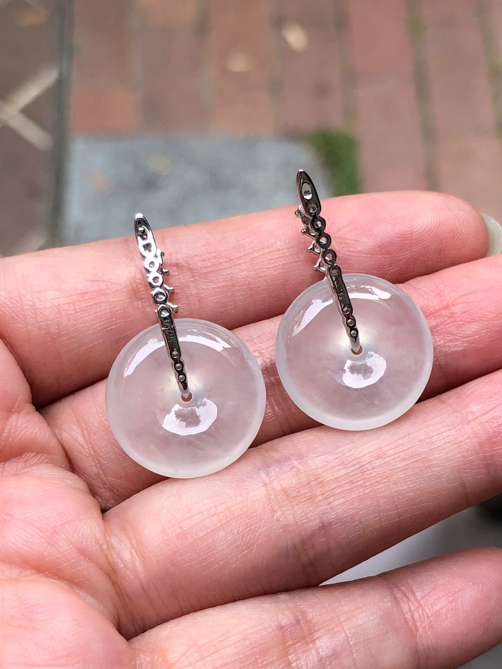 Natural Type A highly translucent, near glassy icy white jadeite safety coin earrings set in 18K white gold and natural diamonds | ClassicJade Singapore