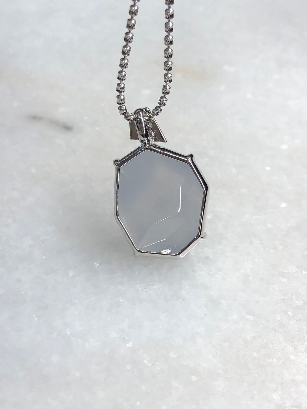 Natural Type A icy white faceted jadeite pendant in 18K white gold and natural diamonds | ClassicJade Singapore