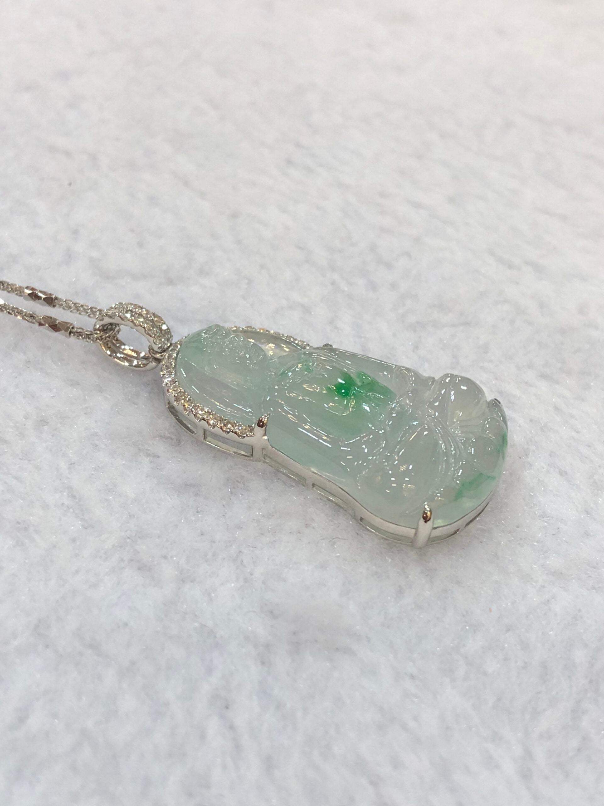Icy Green Jade Guan Yin Pendant