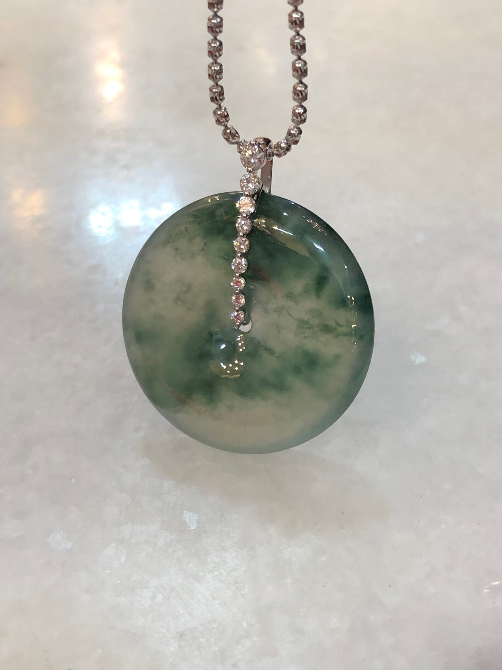 Icy with Bluish Green Floral Jade Safety Coin