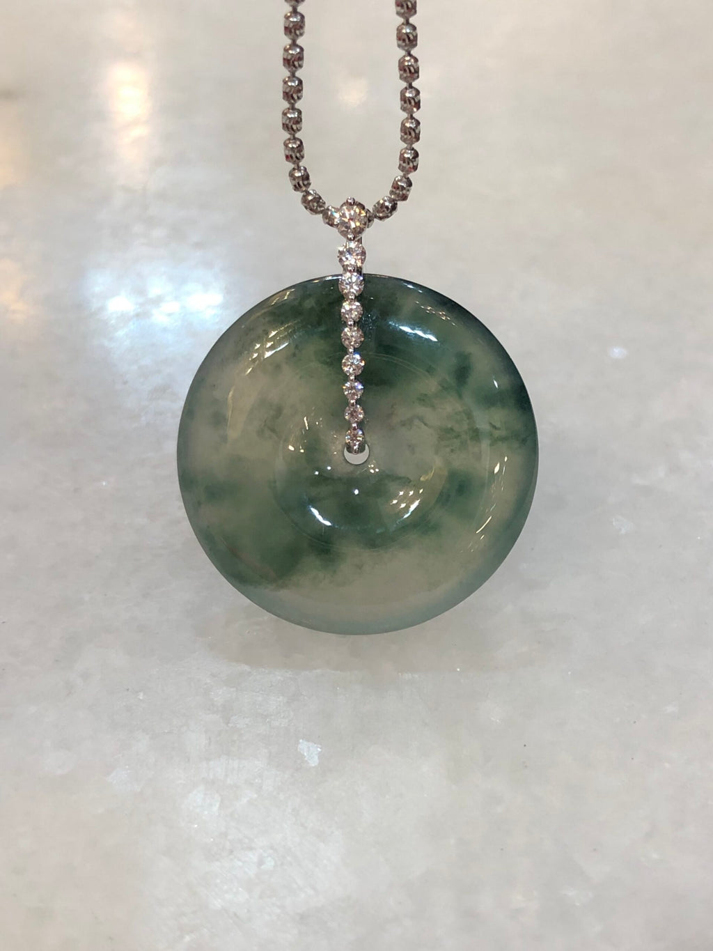 Icy with Bluish Green Floral Jade Safety Coin